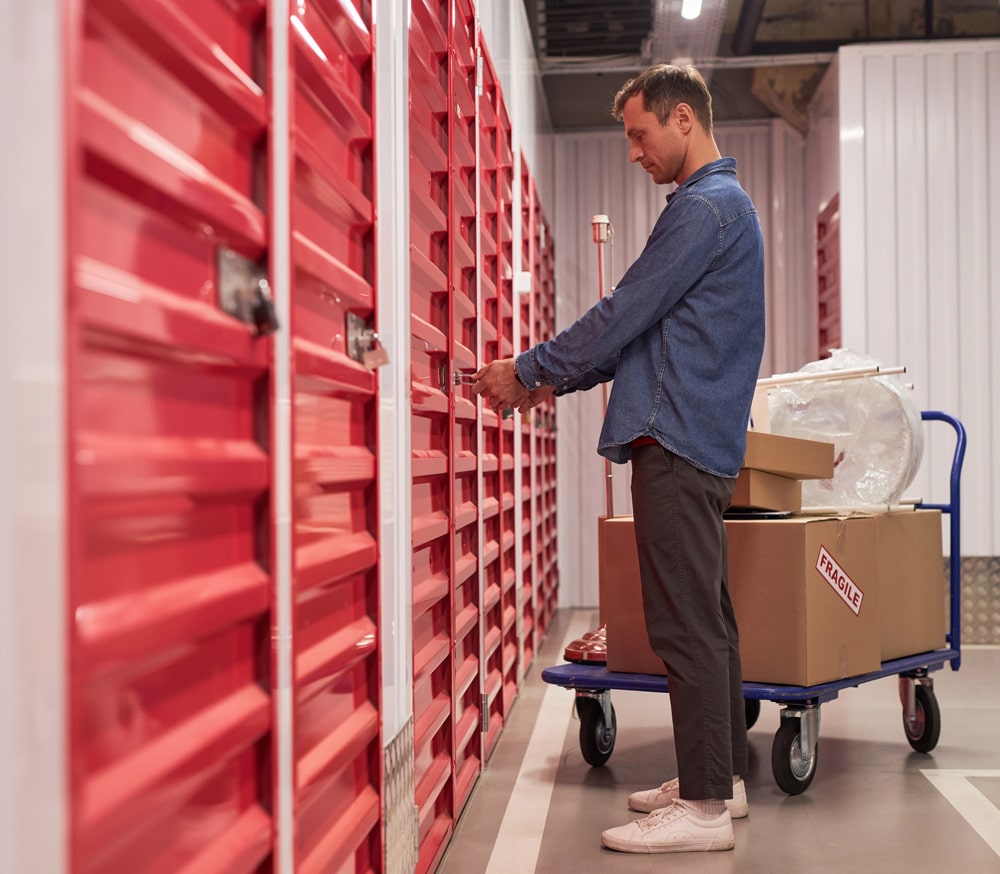 customer-opening-lock-of-unit-in-self-storage-facility